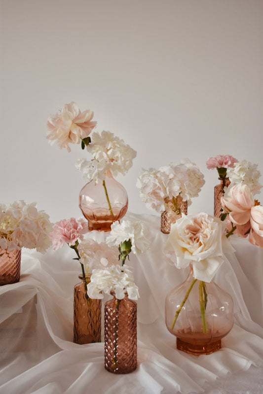 LOCATION Soliflores en verre rose ambré
